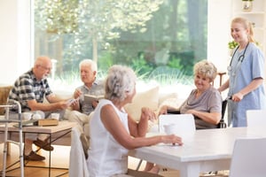 old-people-in-care-home-common-area